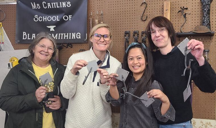 A class shows off their very first hooks!